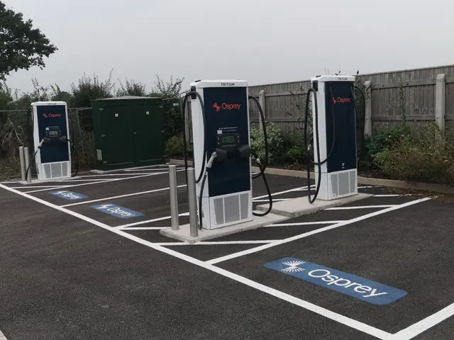 Three rapid EV chargers and a feeder pillar installed at a public charging hub